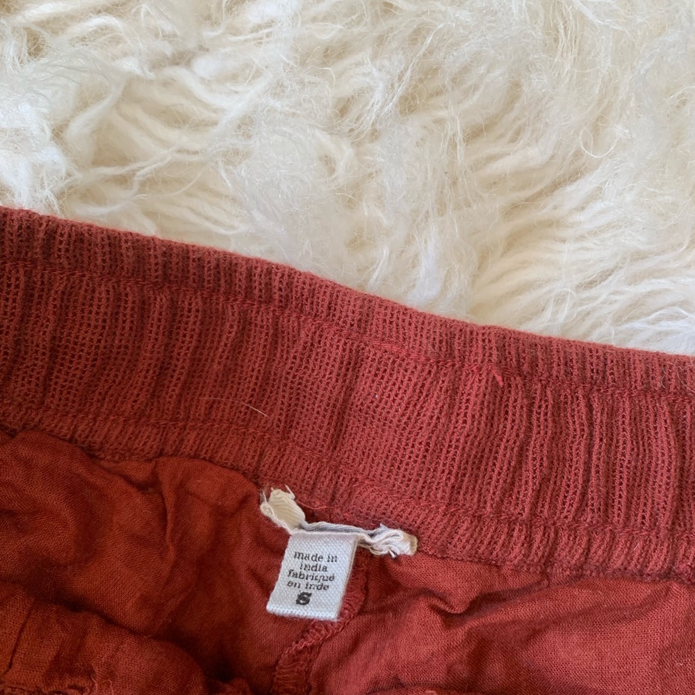 Embroidered rust colored flowy shorts